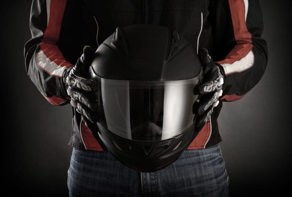 High-quality black motorcycle helmet with tinted visor for safety and style.